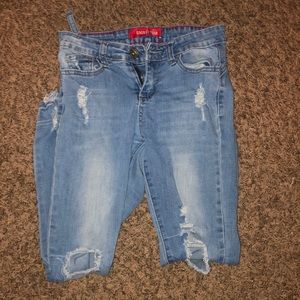 High rise blue jeans